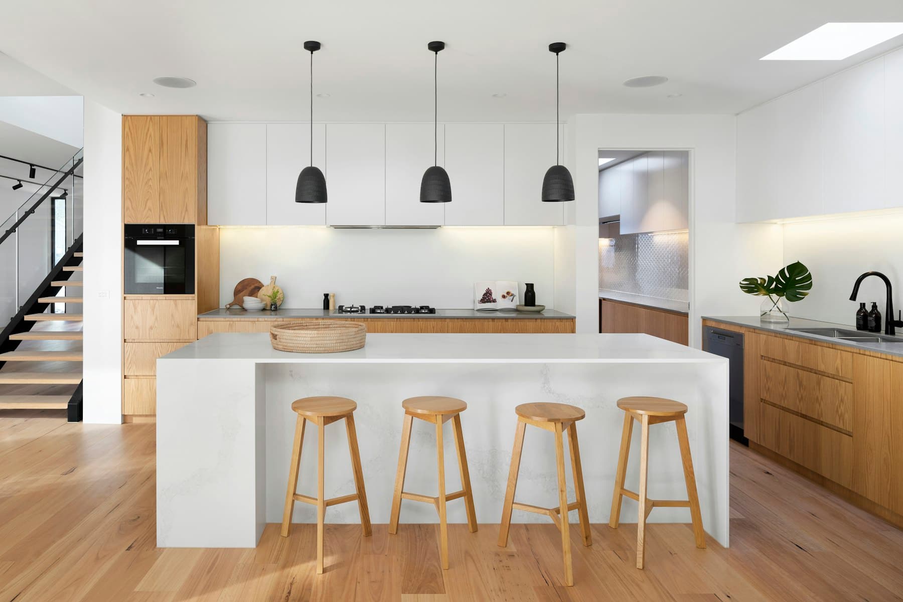 The kitchen, Calacatta marble and white oak