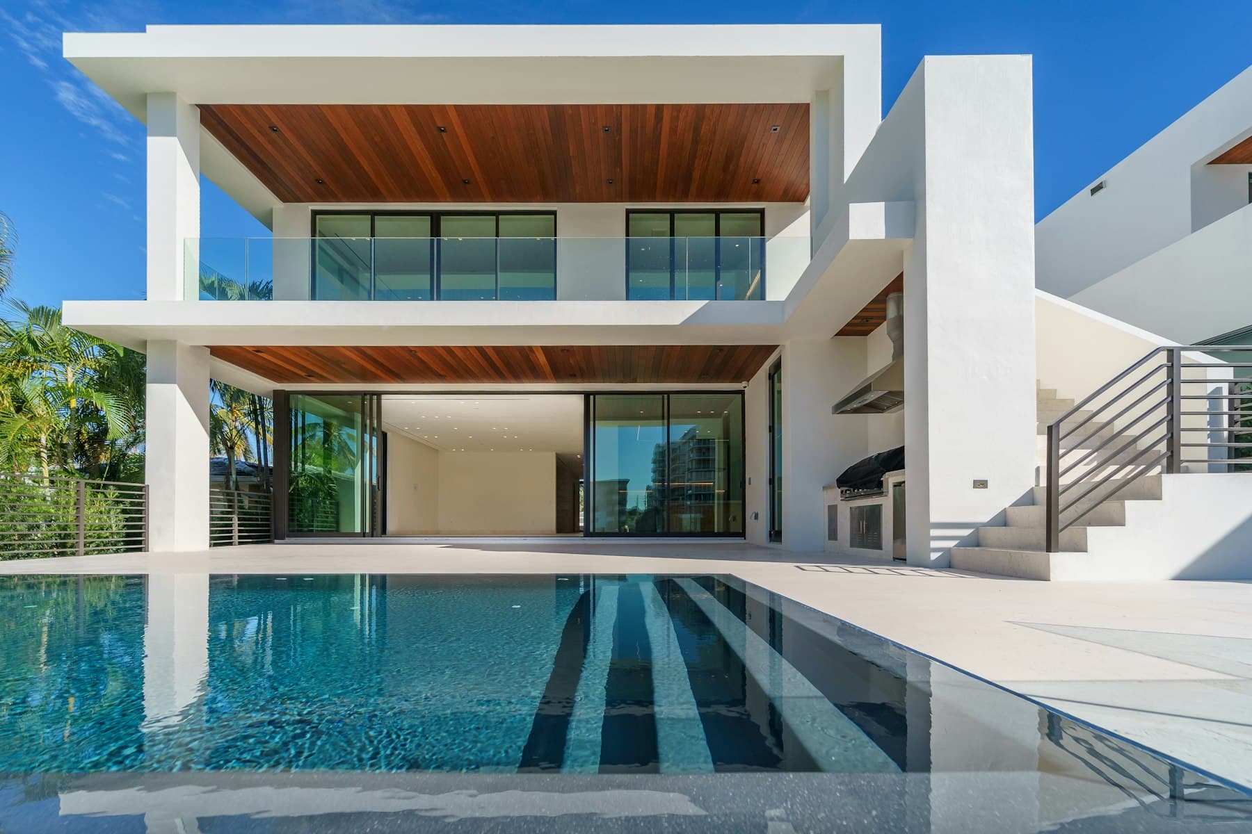 The pool, cantilevered forty feet past the bluff